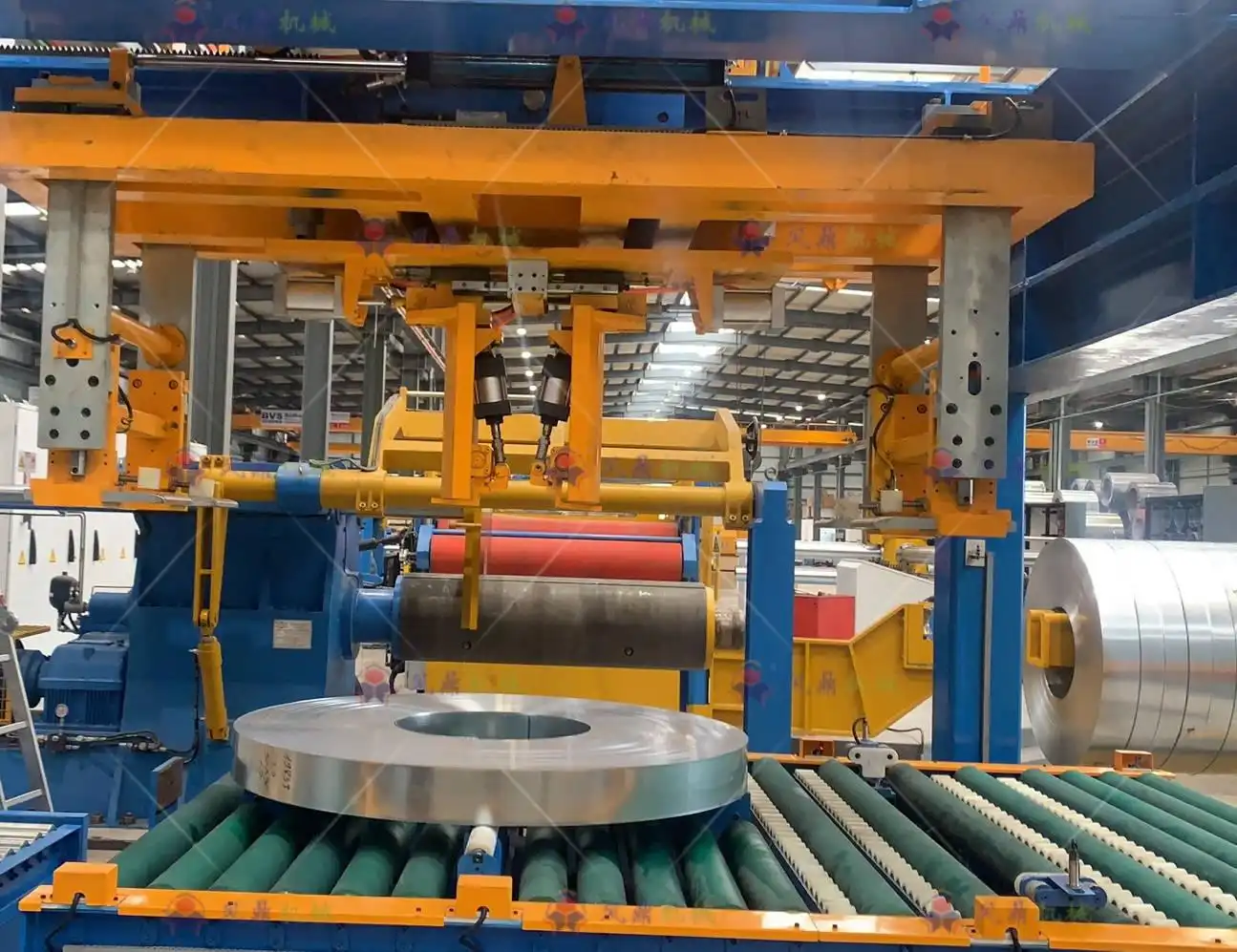 Slit coil handling and packing line for strip coils