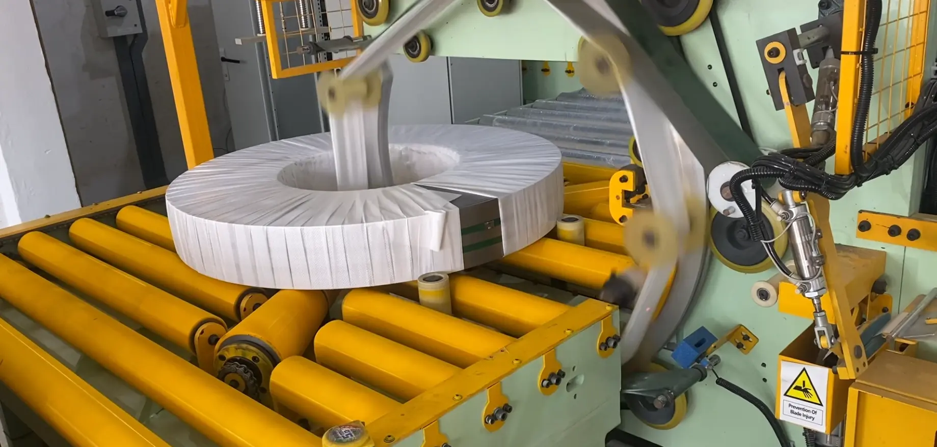 Slitting Coil Packaging Line with Turntable Stacker — detail view 1